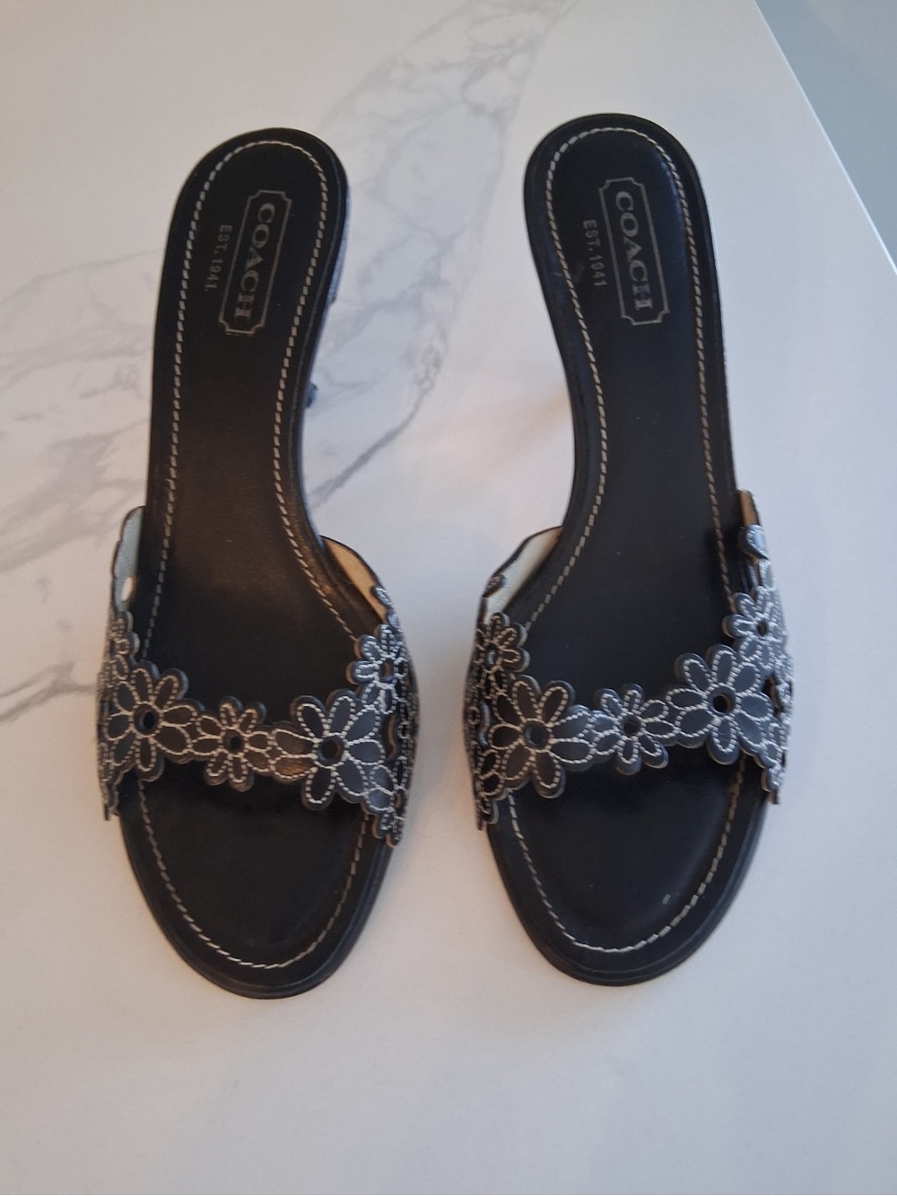 Coach Black Slide Sandals with Silver Floral Appliqué